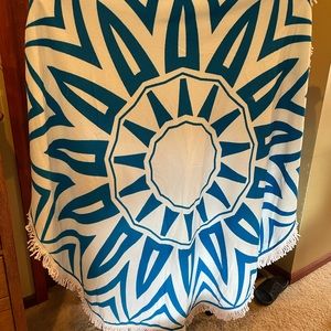 66” round Beach Towel.  Could be a beach towel, wrap,Or a table cloth
